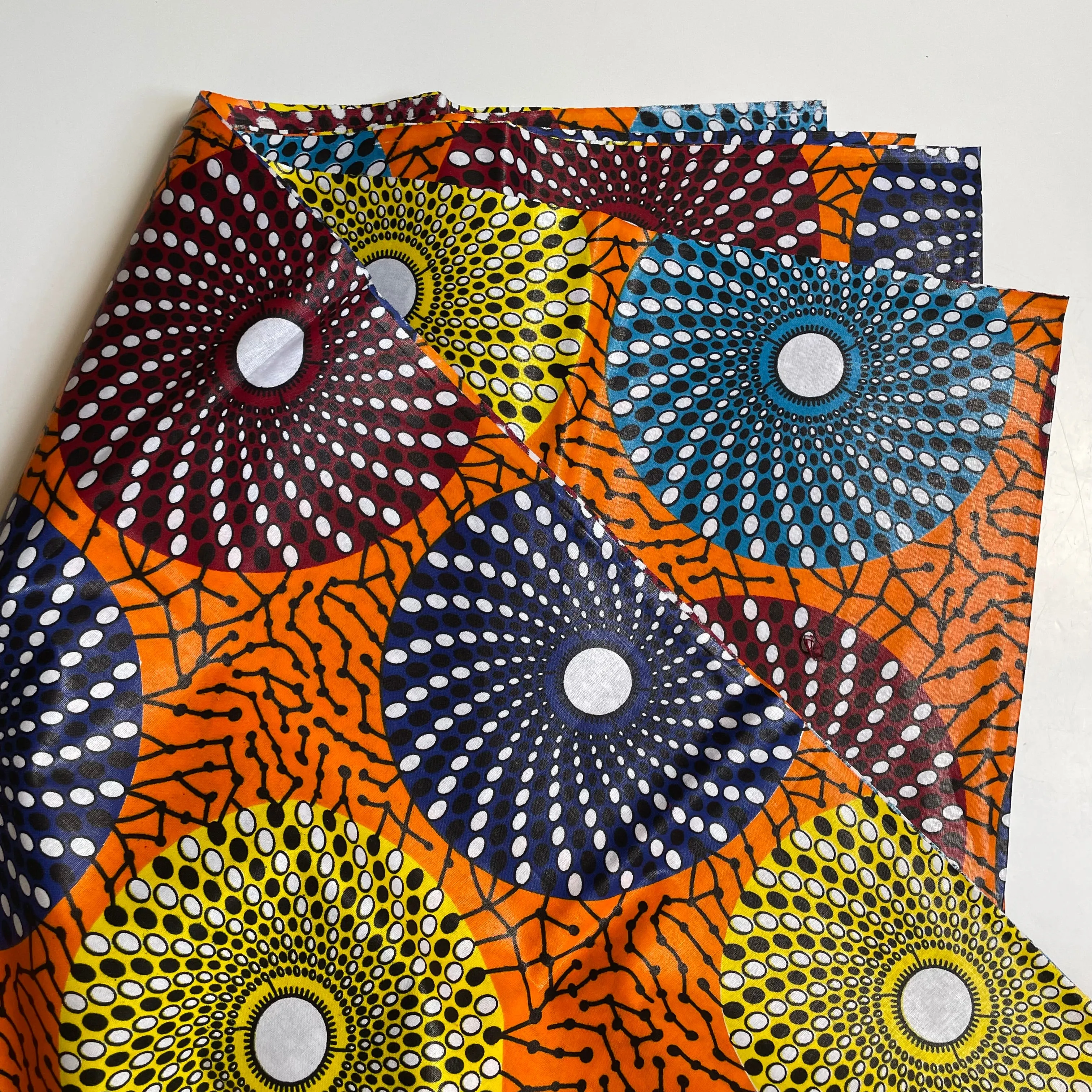 Wax Print Cotton - Multicolor Disks on Orange